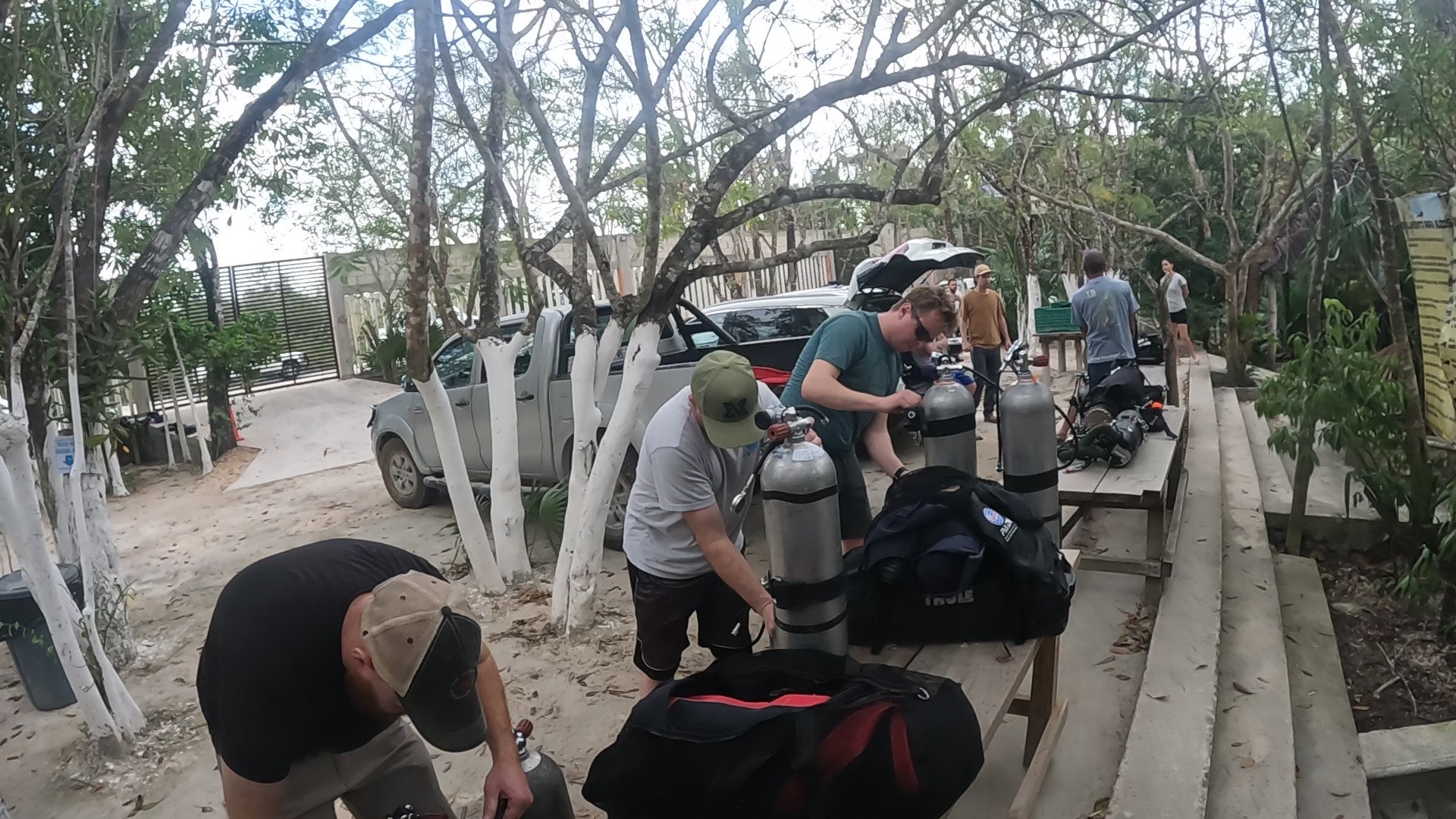 Divers setting up gear for their dive